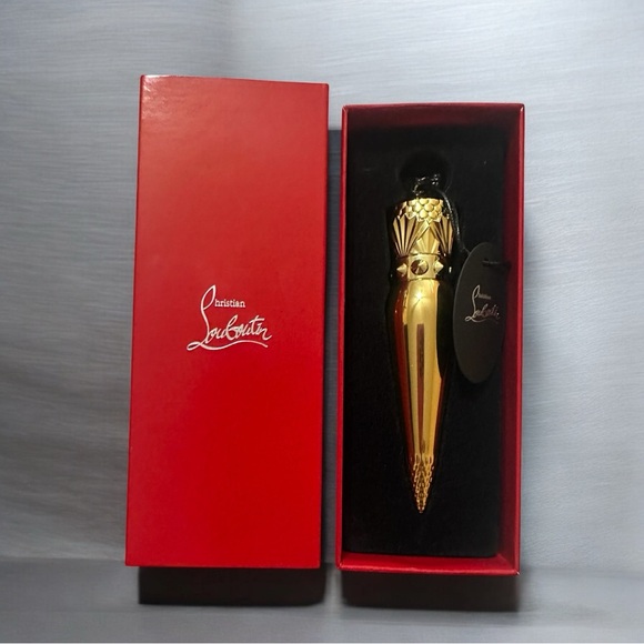 Christian Louboutin Lipstick color 001 - refillable or use charm after